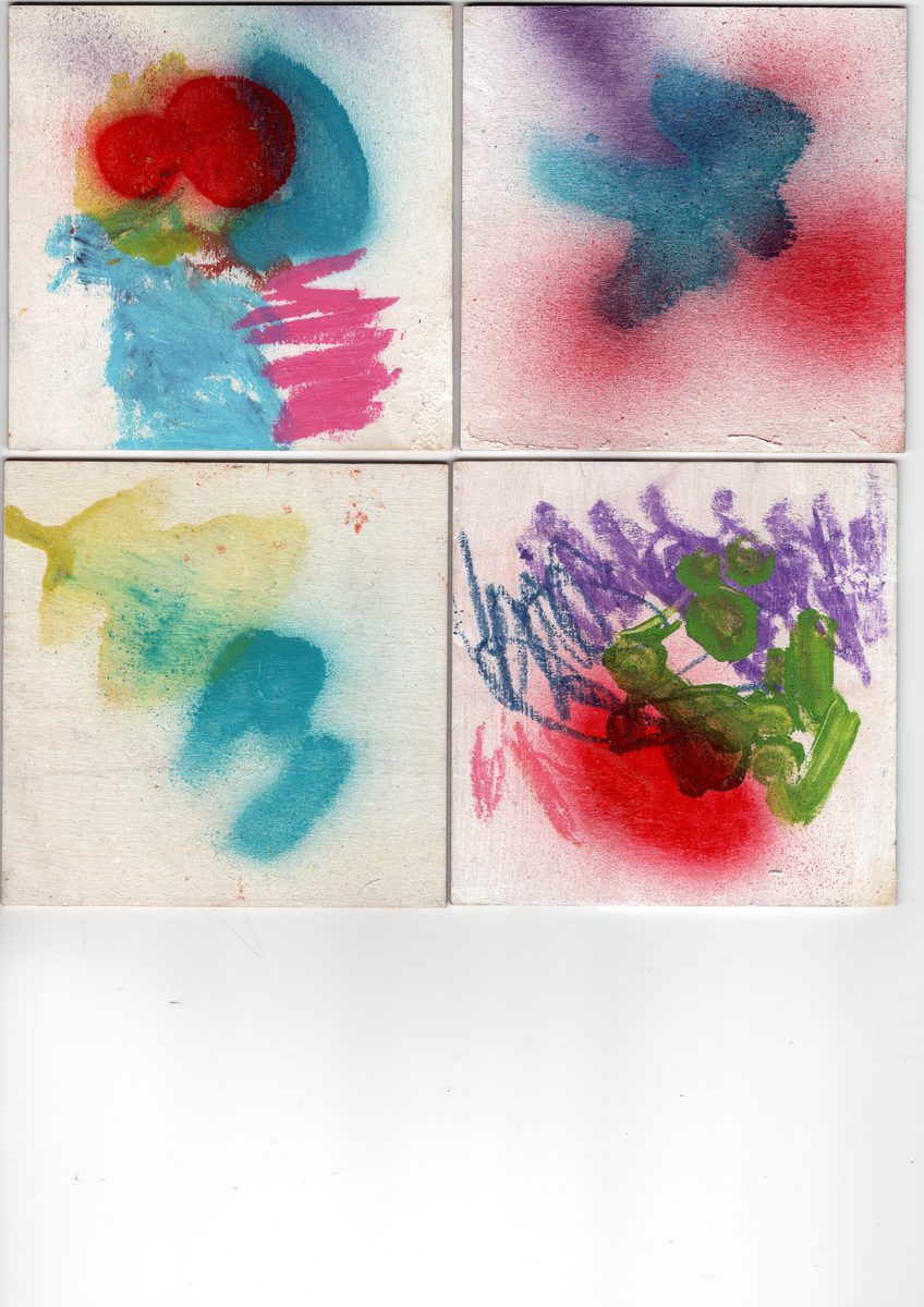 Four small gestural paintings. Pink, orange, teal, yellow — high-chroma marks on white board.